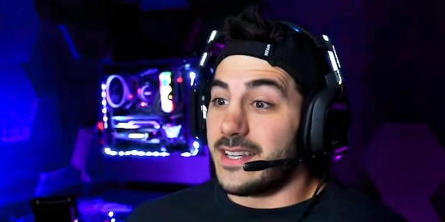 Streamer NICKMERCS wearing a headset, likely talking to his chat on-stream.