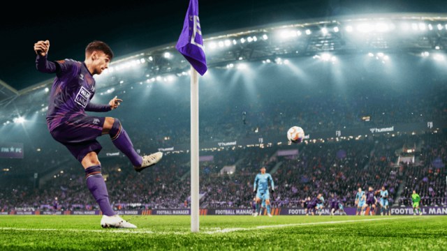 Football player wearing purple taking a corner