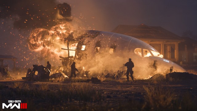 Soldiers survey a plane wreckage in the MW3 campaign.