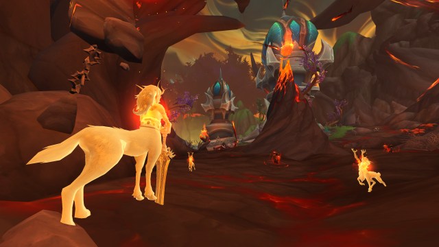 Drayds and Centaurs burn with a blazing orange glow in a burnt-out section of the Emerald Dream in WoW Dragonflight