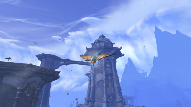 A tower in World of Warcraft featuring a dragonriding mount soaring past it.